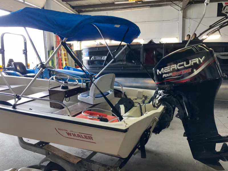Slide: The Image of 1989 Boston Whaler 13 Sport with Mercury outboard motor. - 3