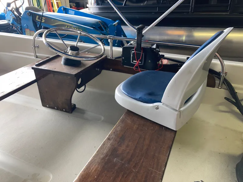 Slide: The Image of Interior of a 1989 Boston Whaler 13 Sport boat. - 4