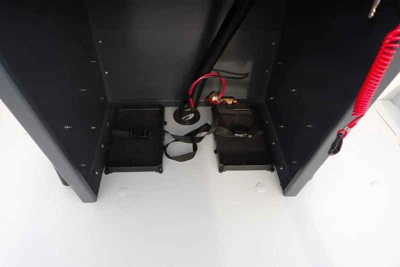 Slide: The Image of Interior view of 2026 Crestliner 1870 Retriever FCC boat console wiring and components. - 21