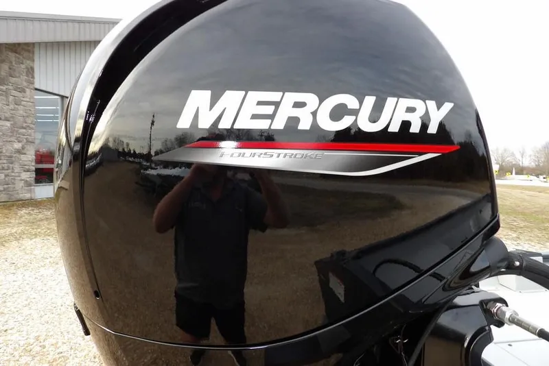 Slide: The Image of Mercury FourStroke engine on 2026 Crestliner 1870 Retriever FCC boat, outdoor setting. - 31
