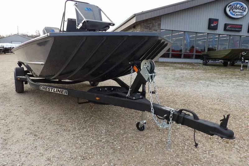 Slide: The Image of 2026 Crestliner 1870 Retriever FCC boat on trailer at marine center. - 34