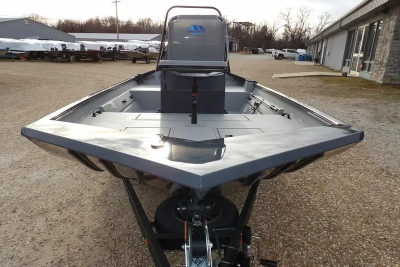 Slide: The Image of 2026 Crestliner 1870 Retriever FCC boat on trailer, parked outdoors. - 4