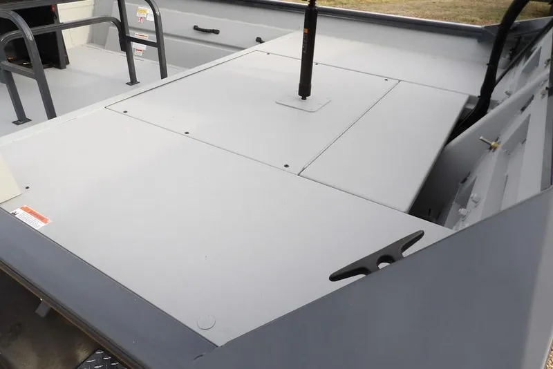 Slide: The Image of 2026 Crestliner 1870 Retriever FCC boat interior with storage compartments and seating. - 7