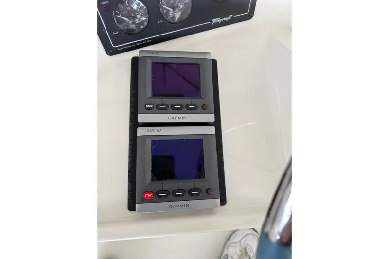 Slide: The Image of Garmin GHC 10 displays on 1994 Tollycraft 45 Cockpit Motor Yacht dashboard. - 35