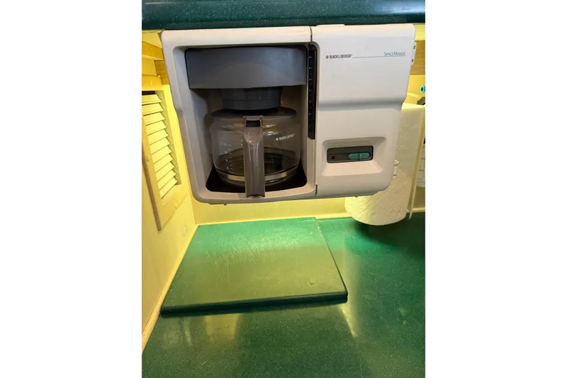 Slide: The Image of Built-in coffee maker on 1994 Tollycraft 45 Cockpit Motor Yacht kitchen counter. - 46