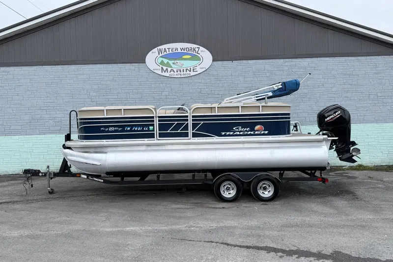 The Image of 2020 Sun Tracker Party Barge 20 DLX pontoon boat on trailer at Water Workz Marine. - 0