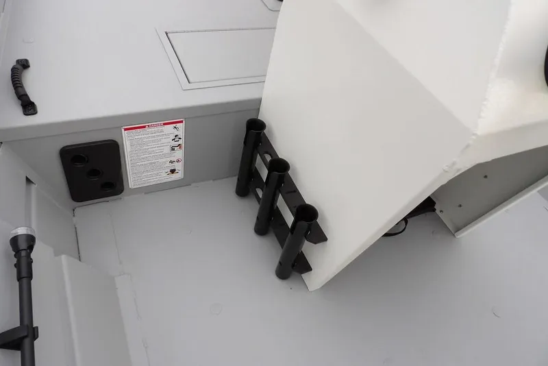 Slide: The Image of Interior of 2026 Crestliner 1870 Retriever FCC boat with rod holders and storage. - 20