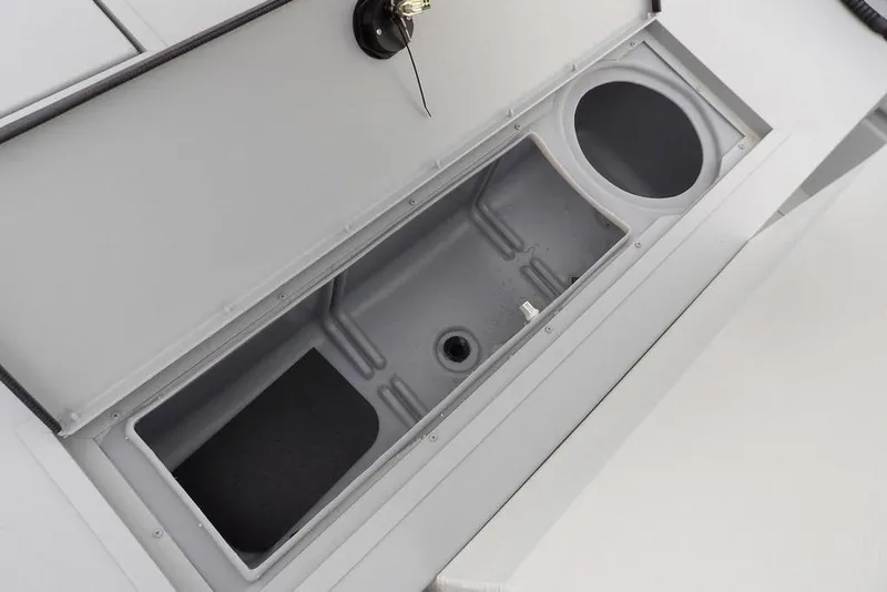 Slide: The Image of Open storage compartment in 2026 Crestliner 1870 Retriever FCC boat. - 27