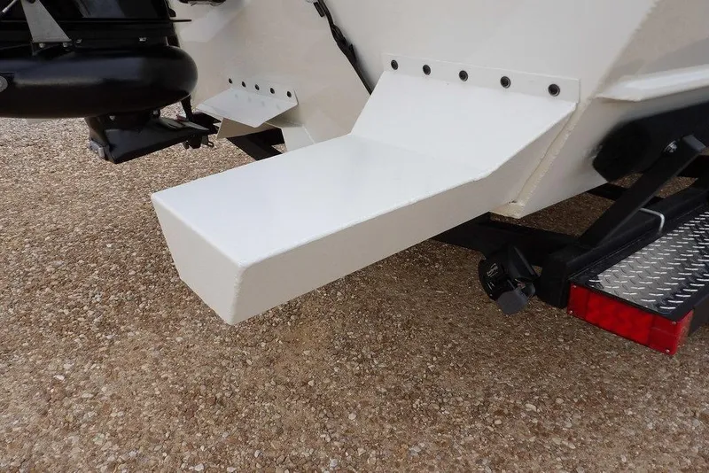 Slide: The Image of 2026 Crestliner 1870 Retriever FCC boat trailer detail on gravel surface. - 28