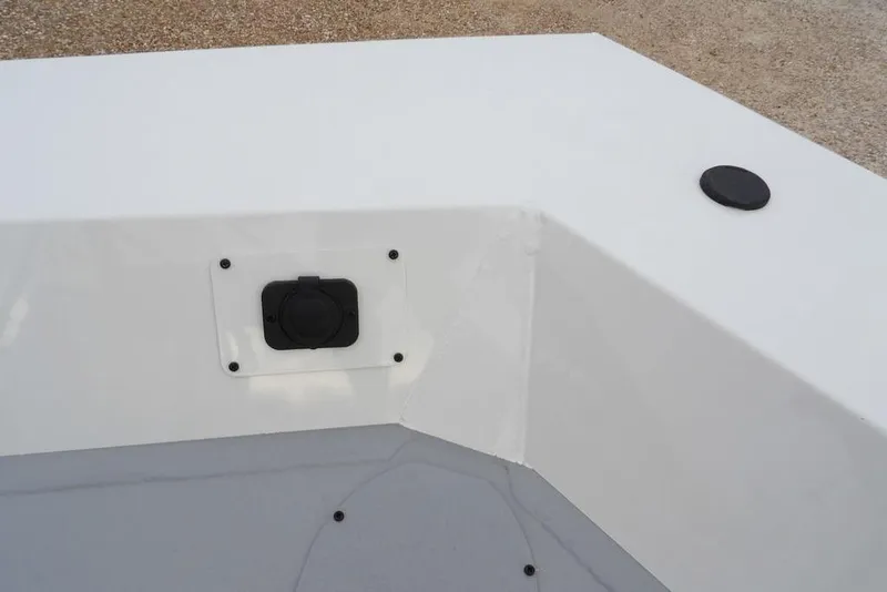 Slide: The Image of 2026 Crestliner 1870 Retriever FCC boat interior detail with white and gray surfaces. - 30