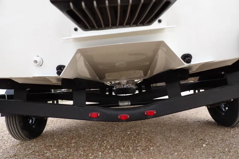 Slide: The Image of 2026 Crestliner 1870 Retriever FCC boat trailer close-up with red reflectors. - 32