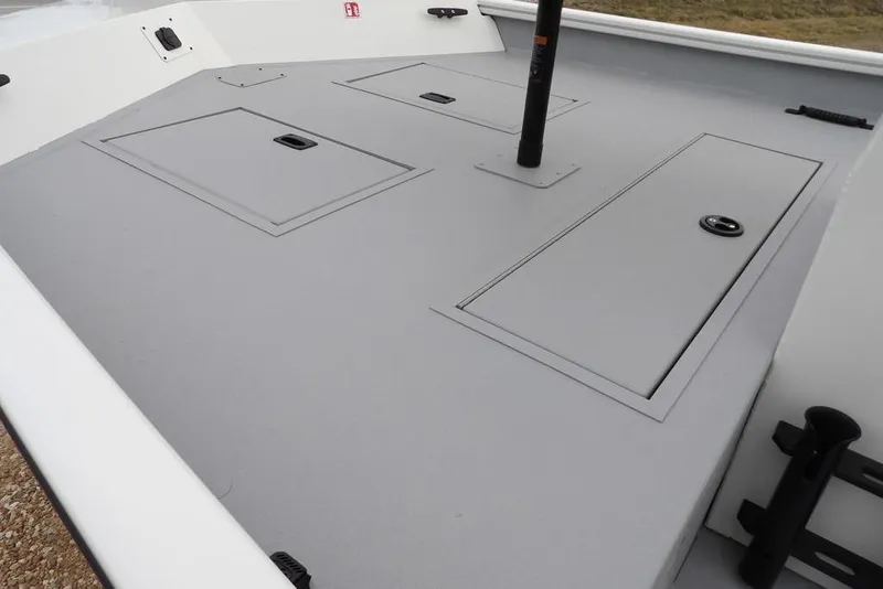 Slide: The Image of 2026 Crestliner 1870 Retriever FCC boat deck with storage compartments. - 9