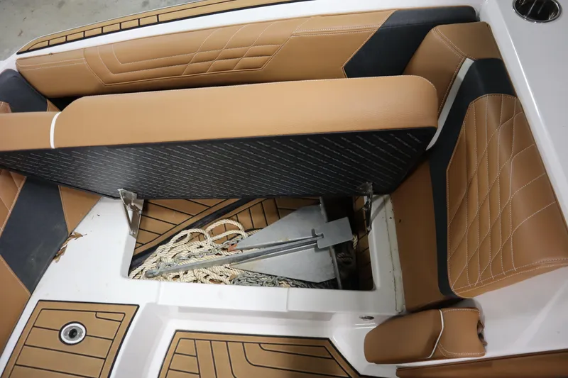 Slide: The Image of 2023 Nautique Super Air Nautique G23 boat interior storage with anchor and rope. - 9