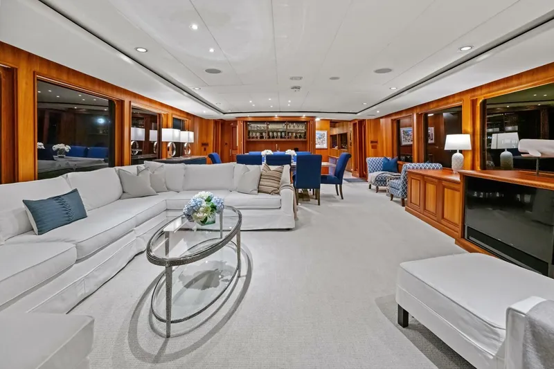 Slide: The Image of Luxurious interior of 1998 Burger Raised Pilothouse yacht with elegant seating and wooden accents. - 1