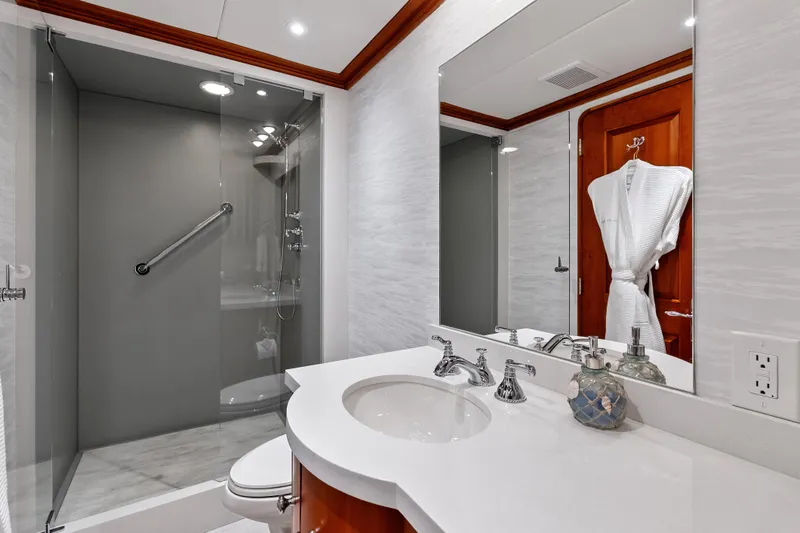 Slide: The Image of Luxurious bathroom in 1998 Burger Raised Pilothouse yacht with modern shower and elegant fixtures. - 26