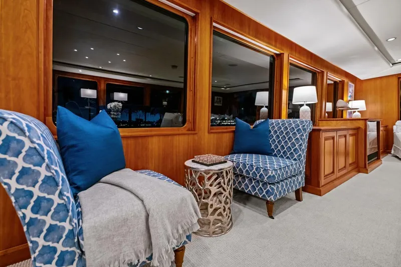 Slide: The Image of Luxurious interior of 1998 Burger Raised Pilothouse yacht with elegant seating and decor. - 3