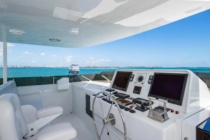 Slide: The Image of Raised pilothouse of 1998 Burger yacht with ocean view and navigation equipment. - 42