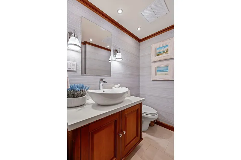 Slide: The Image of Luxurious bathroom on 1998 Burger Raised Pilothouse yacht with elegant fixtures and decor. - 6
