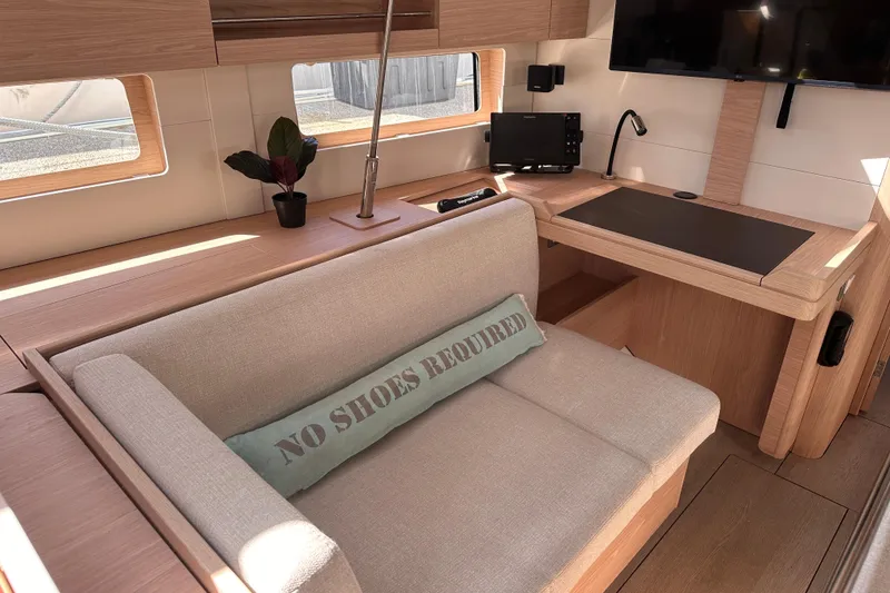 Slide: The Image of Luxurious interior of 2025 Beneteau Oceanis 46.1 yacht with cozy seating and modern amenities. - 16
