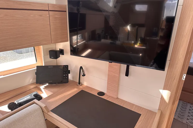 Slide: The Image of Interior of 2025 Beneteau Oceanis 46.1 yacht with modern navigation equipment and sleek design. - 19