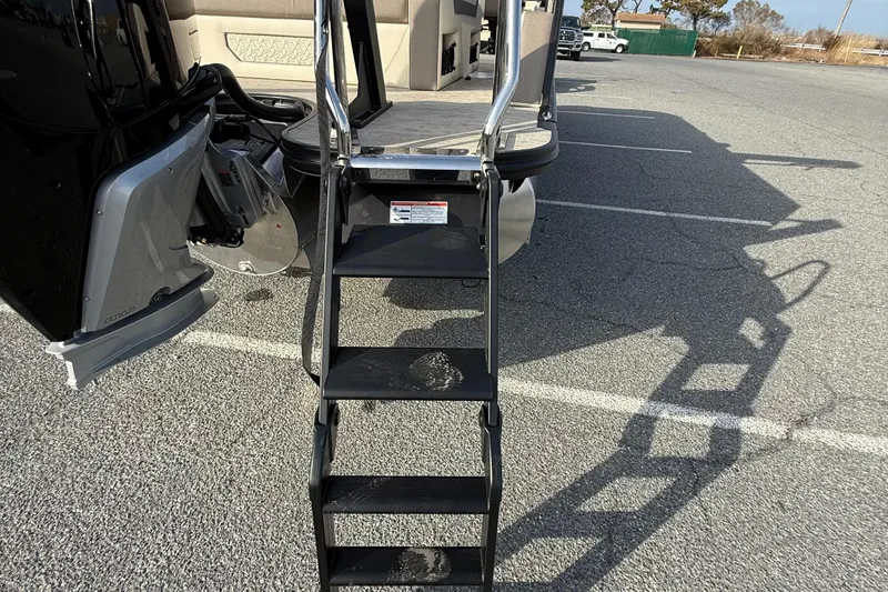 Slide: The Image of Alera M23L 2026 model boat ladder in a parking lot. - 8