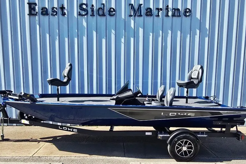 Slide: The Image of 2026 Lowe Stinger 195 Bass boat at East Side Marine dealership. - 12