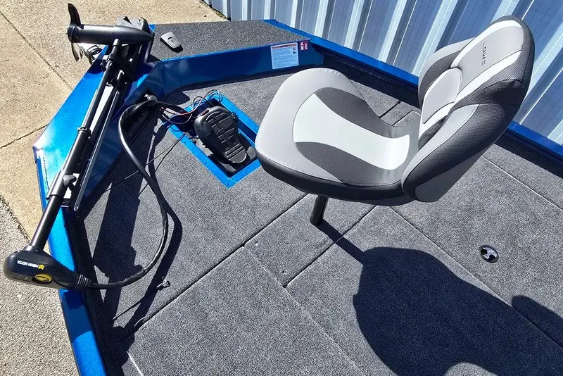 Slide: The Image of 2026 Lowe Stinger 195 Bass boat deck with seat and trolling motor. - 4