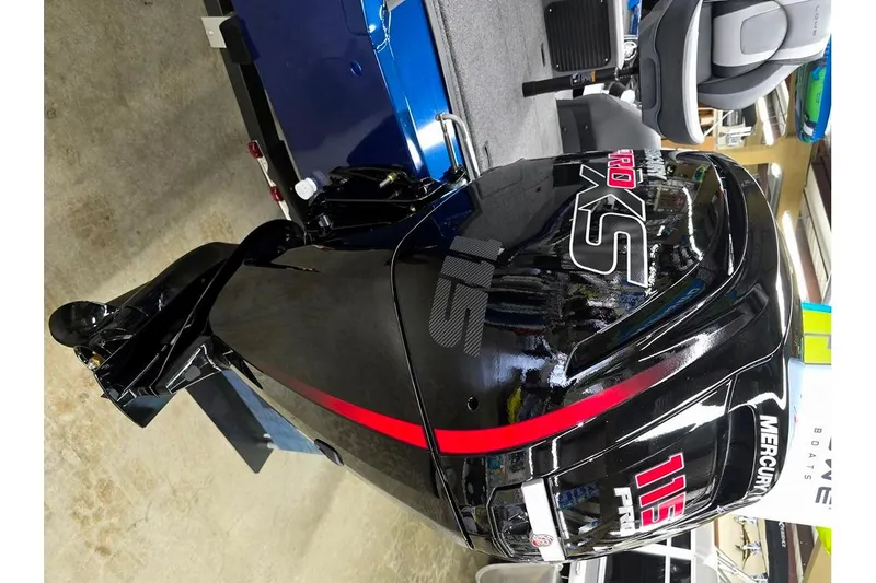Slide: The Image of 2026 Lowe Stinger 195 Bass boat with Mercury 115 Pro XS outboard motor. - 8