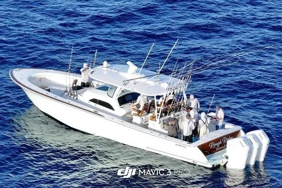 The Image of 2025 Valhalla Boatworks V-46 on ocean, equipped for fishing, with multiple passengers. - 0