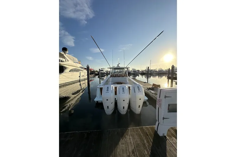 Slide: The Image of 2025 Valhalla Boatworks V-46 docked at marina during sunset. - 18