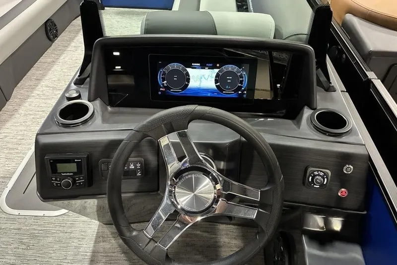 Slide: The Image of 2026 Bennington 23 S Swingback dashboard with modern steering and digital display. - 4