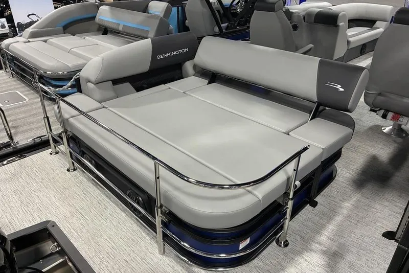 Slide: The Image of 2026 Bennington 23 S Swingback pontoon boat with sleek gray seating and modern design. - 9