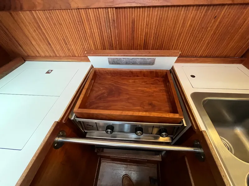 Slide: The Image of Galley area of a 1988 Sabre 34 MK II yacht. - 13