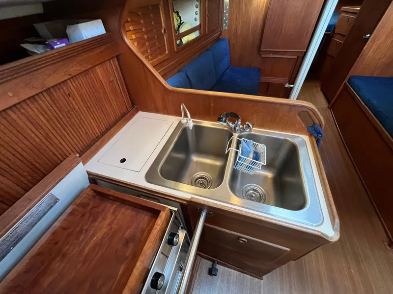 Slide: The Image of Galley area of a 1988 Sabre 34 MK II yacht. - 14