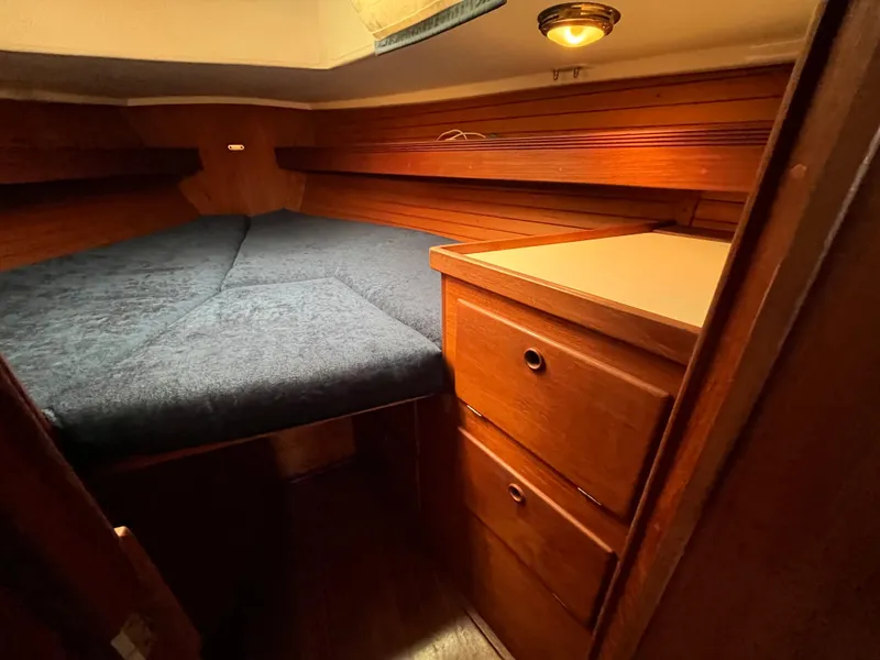 Slide: The Image of Interior of a 1988 Sabre 34 MK II yacht with wooden furnishings. - 29