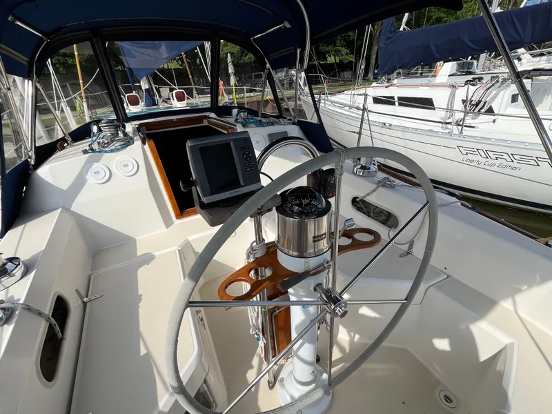 Slide: The Image of Cockpit of a 1988 Sabre 34 MK II yacht with steering wheel. - 35