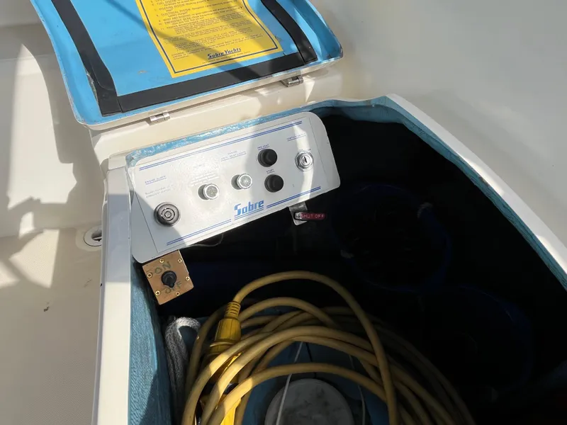 Slide: The Image of 1988 Sabre 34 MK II control panel with cables. - 37