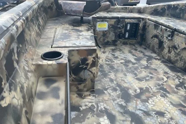 Slide: The Image of 2026 Excel 1751 Viper F4 boat interior with camouflage design and seating area. - 5