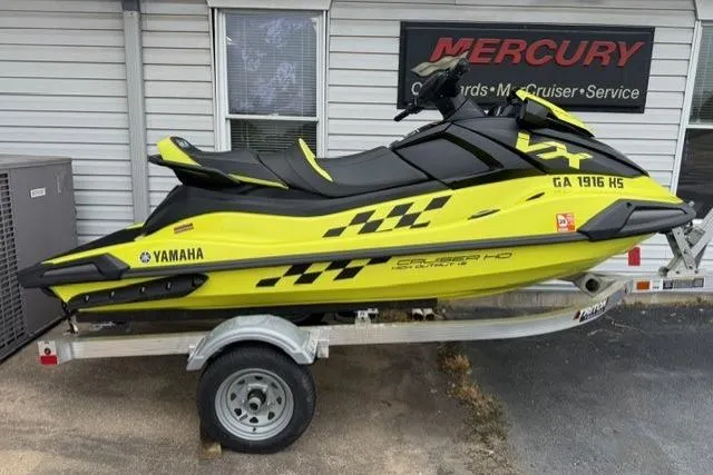 The Image of 2023 Yamaha WaveRunner VX Cruiser HO in bright yellow on a trailer. - 0