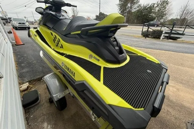 Slide: The Image of 2023 Yamaha WaveRunner VX Cruiser HO in vibrant yellow on a trailer. - 6