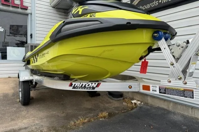 Slide: The Image of 2023 Yamaha WaveRunner VX Cruiser HO on Triton trailer, vibrant yellow color. - 7