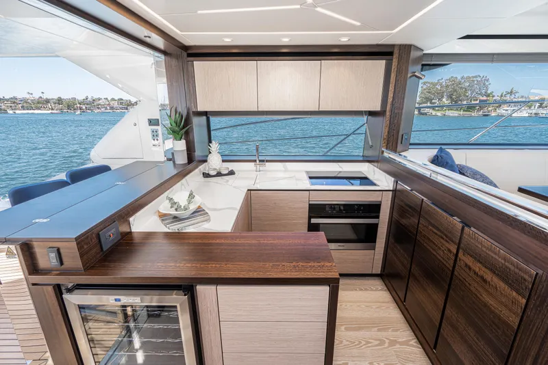 Slide: The Image of Modern kitchen on 2021 Sunseeker Manhattan 55 yacht with ocean view. - 10
