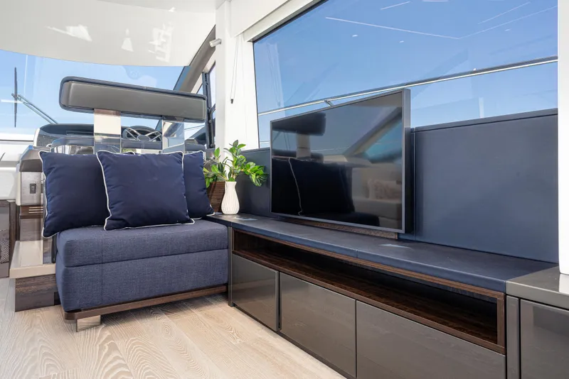 Slide: The Image of Luxurious interior of 2021 Sunseeker Manhattan 55 yacht with modern seating and TV. - 15