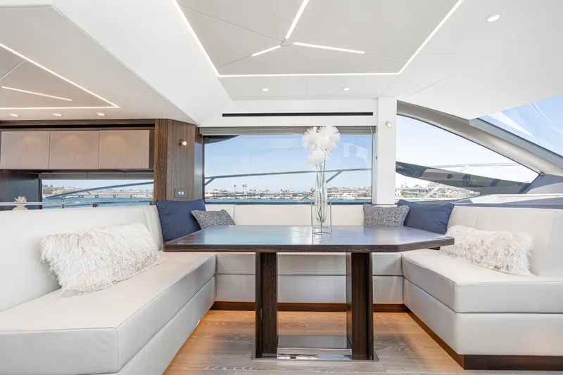 Slide: The Image of Luxurious interior of 2021 Sunseeker Manhattan 55 yacht with elegant seating and dining area. - 16