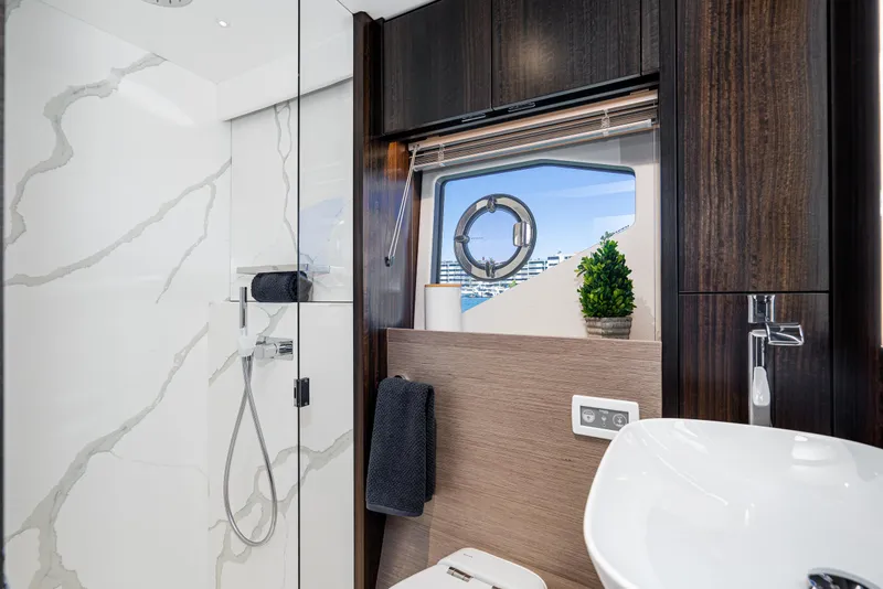 Slide: The Image of Luxurious bathroom in 2021 Sunseeker Manhattan 55 yacht with modern fixtures and ocean view. - 21