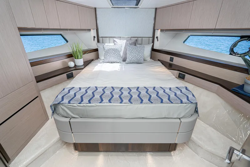 Slide: The Image of Luxurious bedroom interior of 2021 Sunseeker Manhattan 55 yacht with ocean view. - 22