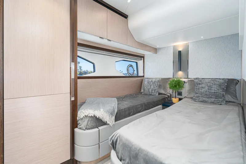 Slide: The Image of Modern bedroom interior on 2021 Sunseeker Manhattan 55 yacht with twin beds and stylish decor. - 23