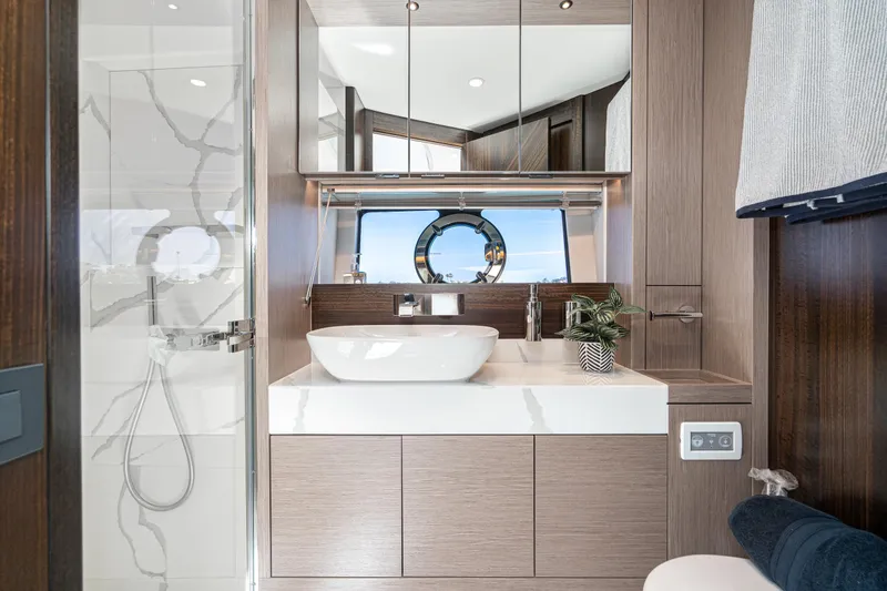 Slide: The Image of Modern bathroom interior on 2021 Sunseeker Manhattan 55 yacht with sleek design and ocean view. - 24