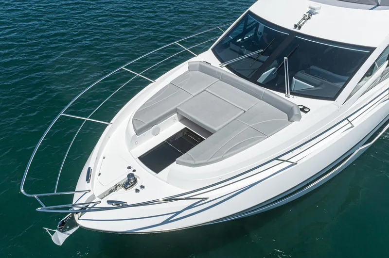 Slide: The Image of 2021 Sunseeker Manhattan 55 yacht with spacious sunbathing area on the bow. - 26