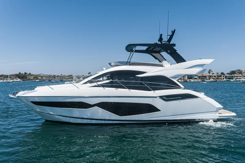 Slide: The Image of 2021 Sunseeker Manhattan 55 yacht cruising on a sunny day. - 36